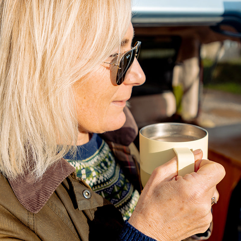 12oz-rise-mug-w0 12oz_rise_coffee_mug_wax_yellow_woman_drink_closeup_square.jpg