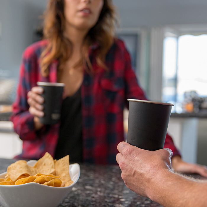 16oz-pint-cup-m5 16ounce_steel_pint_cup_black_party_lifestyle_e7c4b89f-bee2-44df-bb63-bc286febb421.jpg