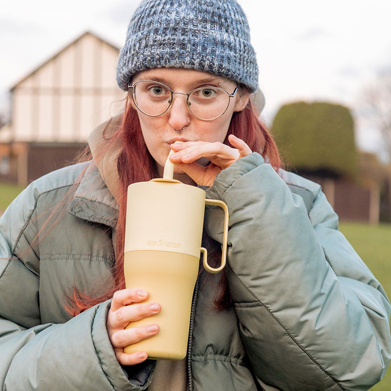 26oz-rise-tumbler-with-straw-lid-t6 26oz_rise_rumbler_straw_wax_yellow_woman_sip_square.jpg