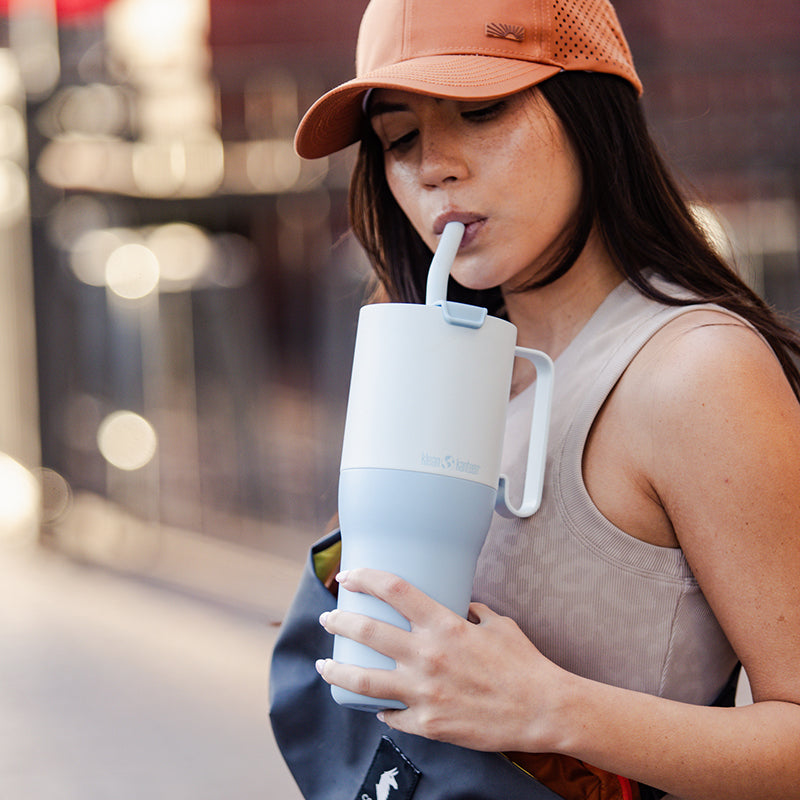 36oz-rise-tumbler-with-straw-lid-z6 36oz_rise_tumbler_straw_girl_sip_square.jpg