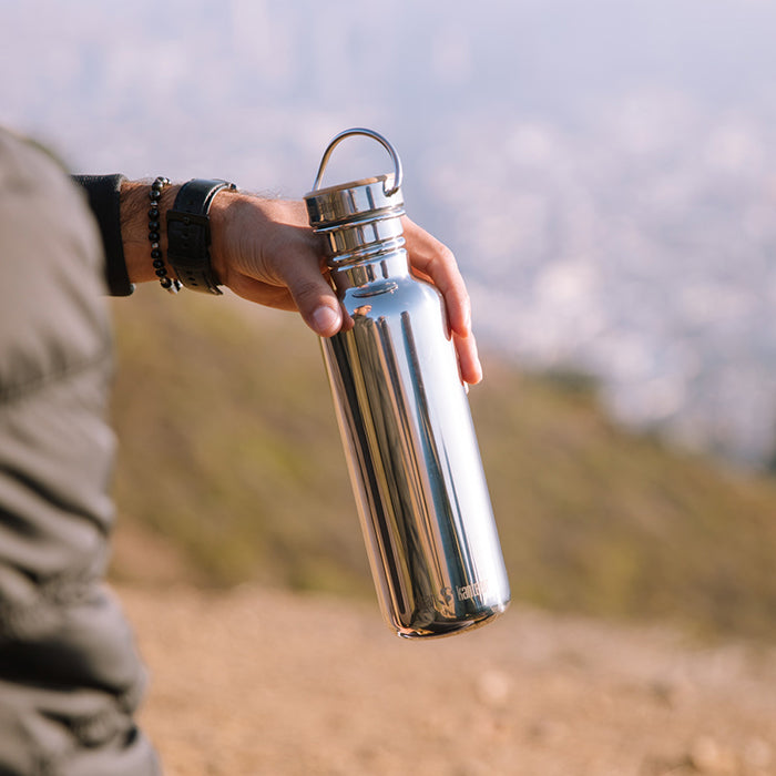 27oz-reflect-with-bamboo-cap-i3 K27SSLRF-MS-BAMBOO_reflect_bottle_hand_lifestyle.jpg